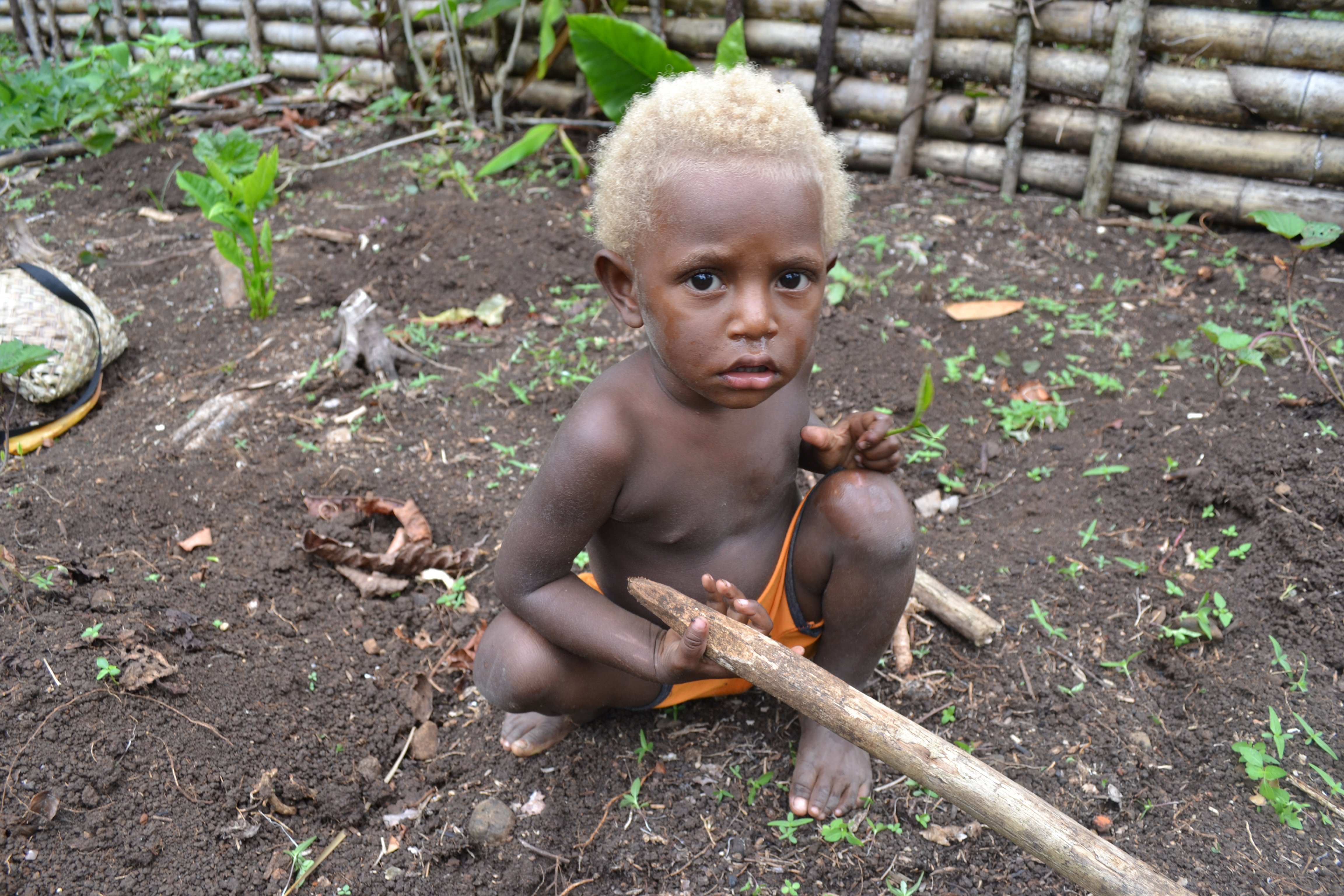 A young child in Komalu where villagers fear deep sea mining may disrupt traditional ways of life. (Credit: Mike Casey) 